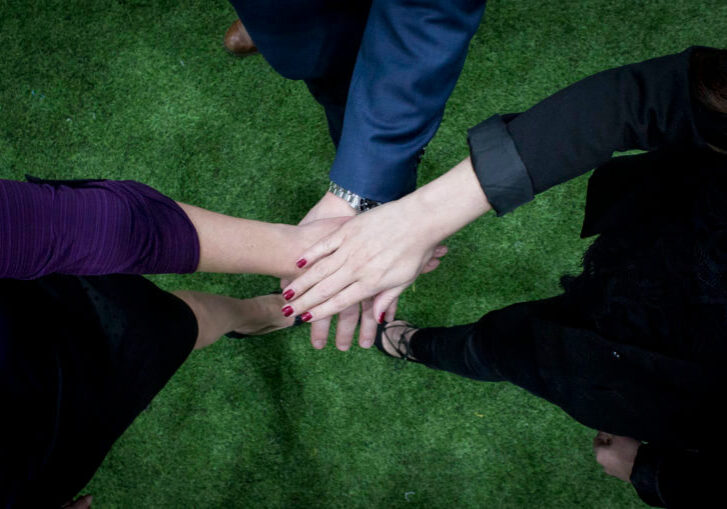 Ethic Advertising hands in Teamwork
