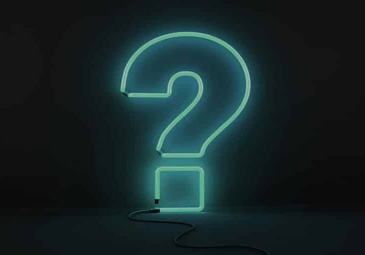 blue ethic advertising agency neon question mark on black background