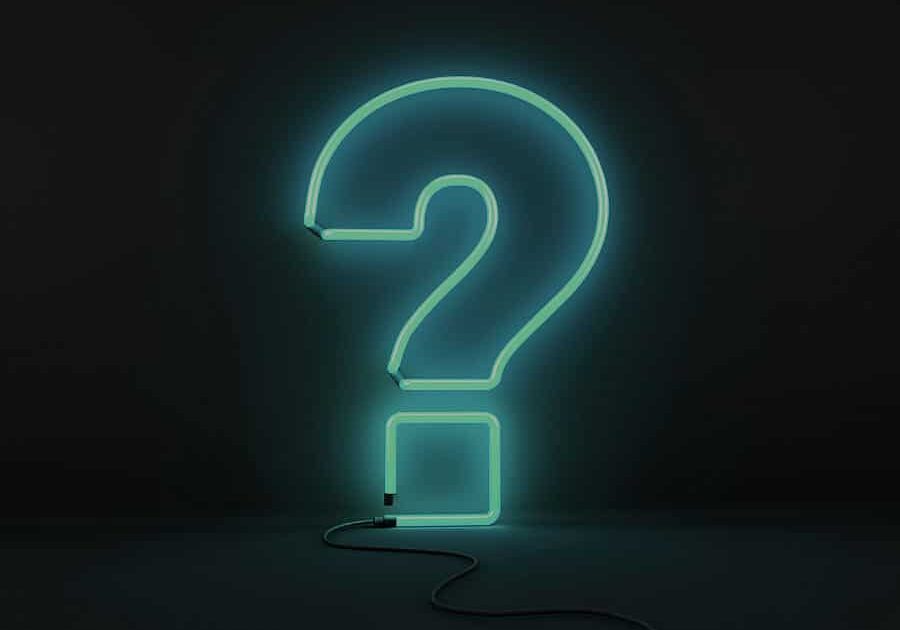blue ethic advertising agency neon question mark on black background