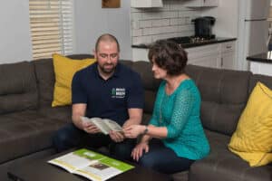 Mold Men speaking with a client to help find the best solution