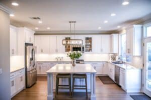 white wooden cabinets in remodeled kitchen